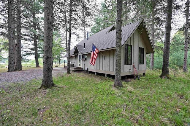 2775 Lake Rd, Barnes, WI 54873 - view of home's exterior with roof with shingles and board and batten siding