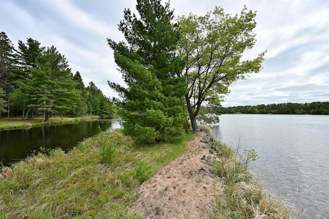 2775 Lake Rd, Barnes, WI 54873 - water view with a heavily wooded area