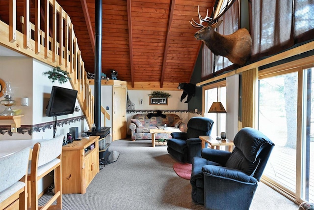 2775 Lake Rd, Barnes, WI 54873 - carpeted living room with wooden ceiling with exposed beams, stairway, and high vaulted ceiling