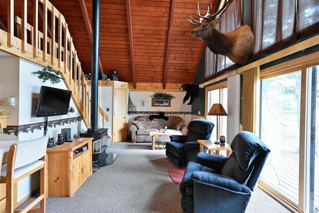 2775 Lake Rd, Barnes, WI 54873 - carpeted living area with wood ceiling with exposed beams, stairway, and high vaulted ceiling
