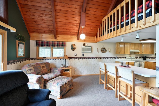 2775 Lake Rd, Barnes, WI 54873 - living area with wooden ceiling, wallpapered walls, carpet flooring, a wall mounted AC, and a wainscoted wall