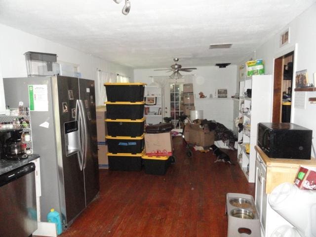 W4643 S Pearl Lake Rd, Redgranite, WI 54970 - kitchen with dark wood-style flooring, stainless steel appliances, and a ceiling fan