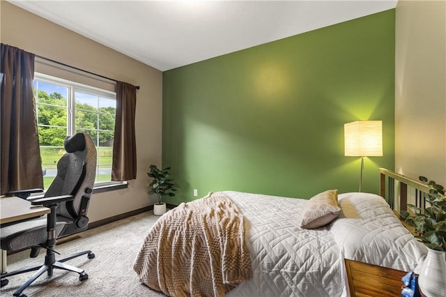 3781 Nicholas Dr, Menomonie, WI 54751 - carpeted bedroom featuring baseboards and a desk