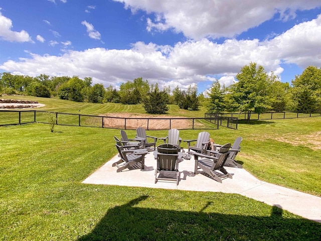 S7915 Ruthe Badger Ln, Merrimac, WI 53561 - view of yard with an outdoor fire pit, a patio area, and view of wooded area