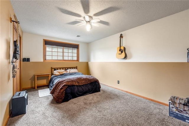 4868 183rd St, Chippewa Falls, WI 54729 - carpeted bedroom with a textured ceiling, baseboards, and a ceiling fan