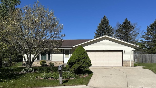 1517 Merry Ct, Port Washington, WI 53074 - ranch-style home with an attached garage, driveway, and brick siding