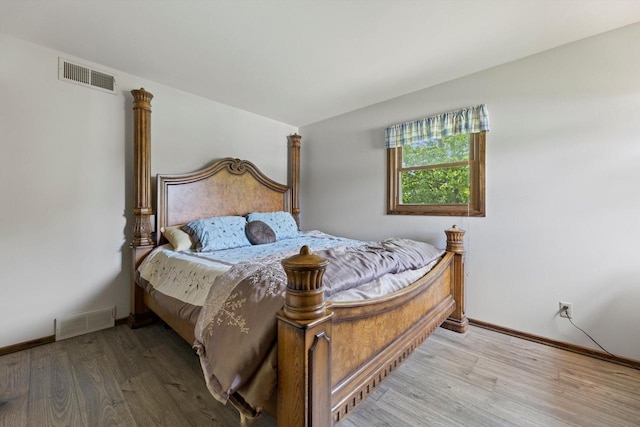 1517 Merry Ct, Port Washington, WI 53074 - bedroom featuring wood finished floors and baseboards