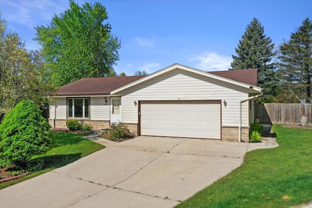 1517 Merry Ct, Port Washington, WI 53074 - ranch-style house with an attached garage, brick siding, and driveway