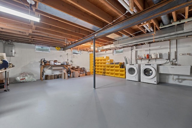 1517 Merry Ct, Port Washington, WI 53074 - below grade area with washer and clothes dryer, a sink, and electric panel