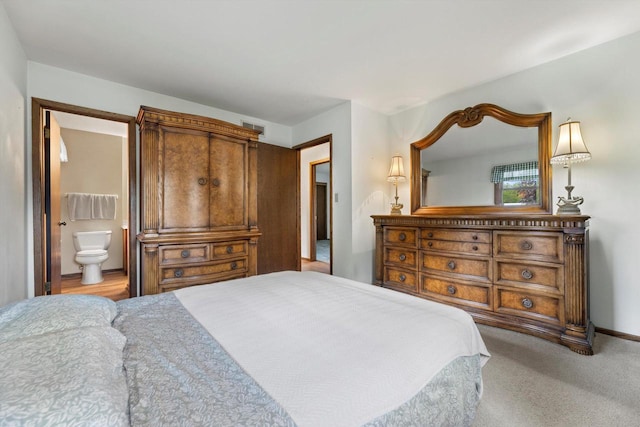 1517 Merry Ct, Port Washington, WI 53074 - bedroom with ensuite bathroom and carpet floors