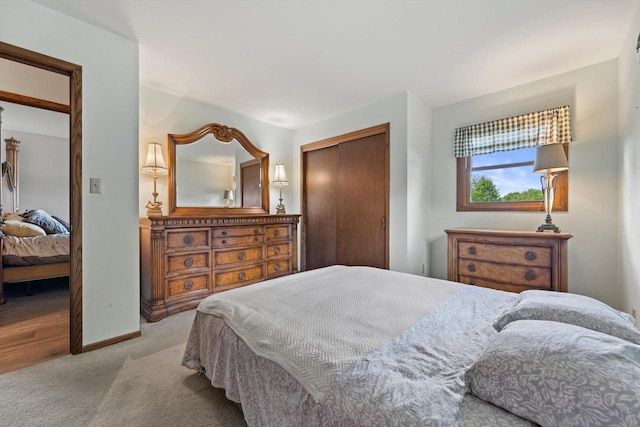 1517 Merry Ct, Port Washington, WI 53074 - carpeted bedroom featuring a closet and baseboards