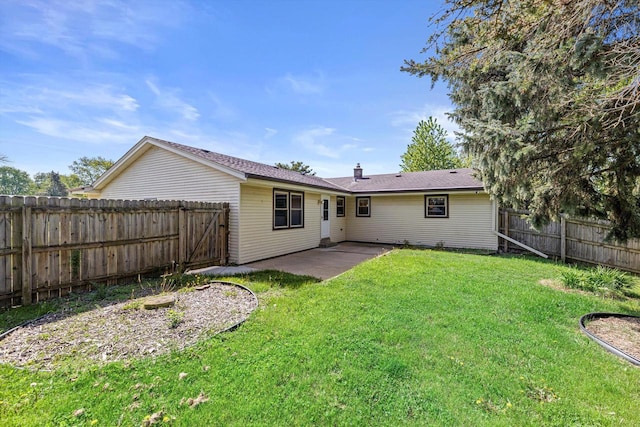 1517 Merry Ct, Port Washington, WI 53074 - rear view of property featuring a patio and a chimney