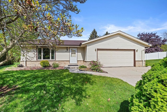 1517 Merry Ct, Port Washington, WI 53074 - single story home featuring brick siding, an attached garage, and driveway