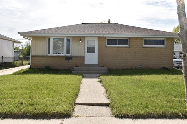 6655 N 78th St, Milwaukee, WI 53223 - bungalow with brick siding and roof with shingles