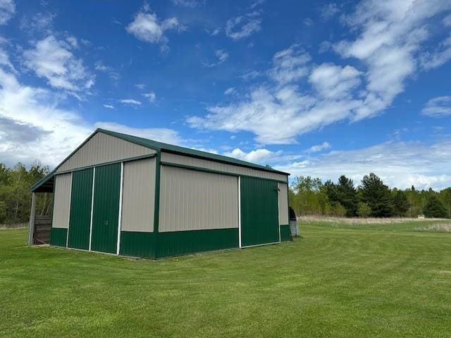 12258 Mosquito Brook Rd, Hayward, WI 54843 - view of pole building featuring a yard