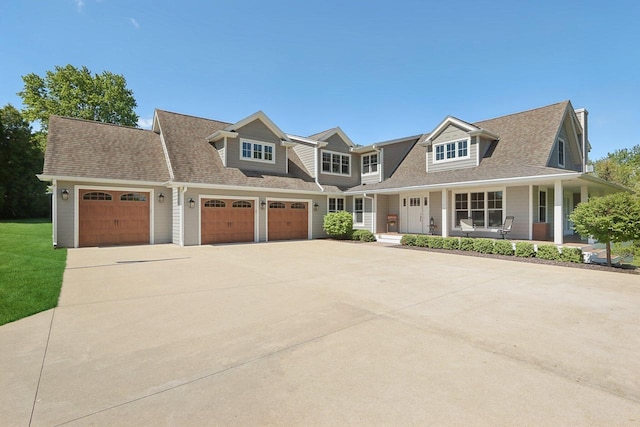 S36W27905 Robin Hill Cir, Waukesha, WI 53189 - view of front of home with a porch, driveway, an attached garage, and roof with shingles