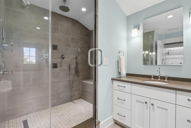 S36W27905 Robin Hill Cir, Waukesha, WI 53189 - bathroom featuring vanity, a stall shower, lofted ceiling, and recessed lighting