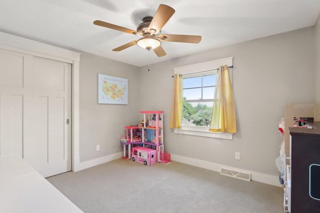S36W27905 Robin Hill Cir, Waukesha, WI 53189 - recreation room with baseboards, a ceiling fan, and carpet floors