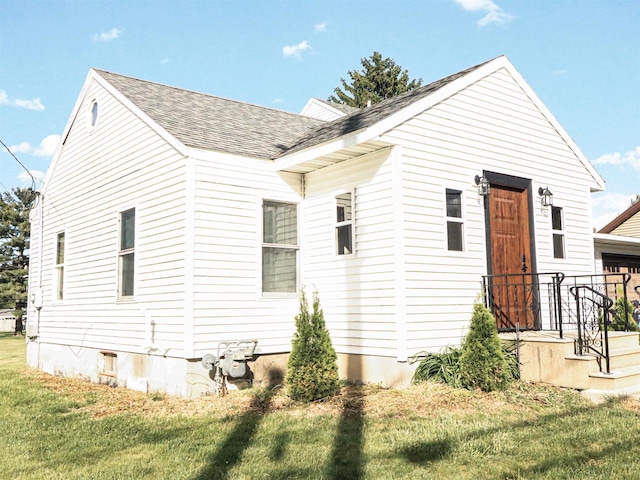 507 Janesville St, Oregon, WI 53575 - view of front of property featuring roof with shingles and a front yard
