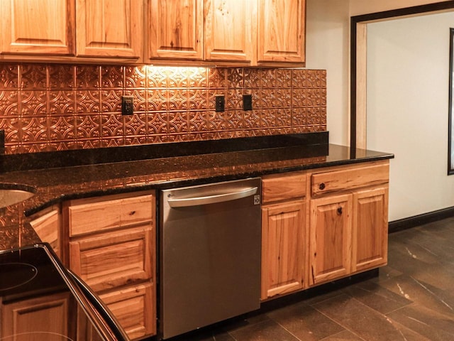 507 Janesville St, Oregon, WI 53575 - kitchen with stainless steel dishwasher, tasteful backsplash, and dark stone counters