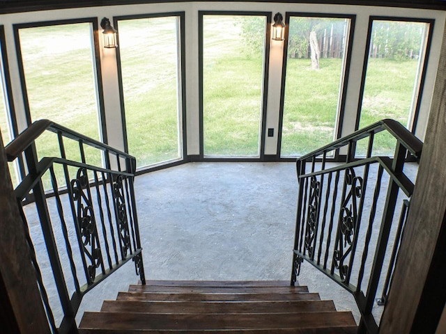 507 Janesville St, Oregon, WI 53575 - staircase featuring concrete floors