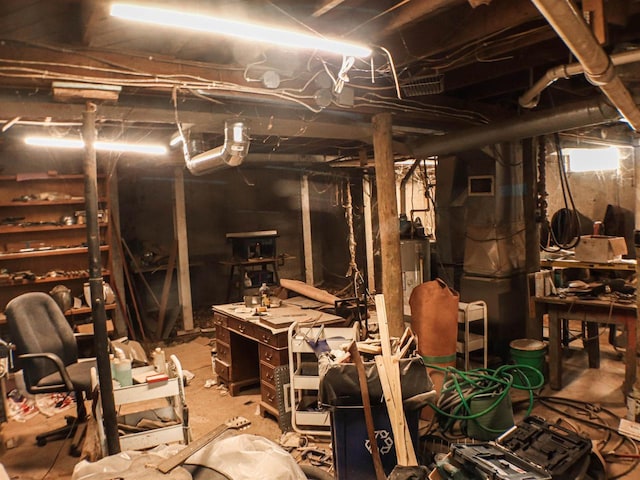 507 Janesville St, Oregon, WI 53575 - unfinished basement featuring water heater