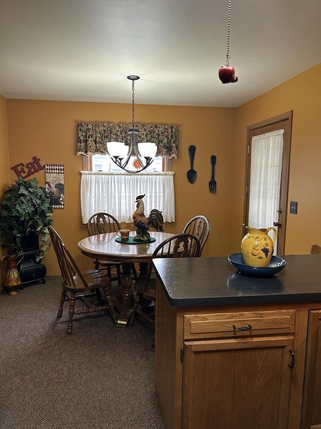 4103 80th St Unit 28A, Kenosha, WI 53142 - dining space with a chandelier and dark carpet
