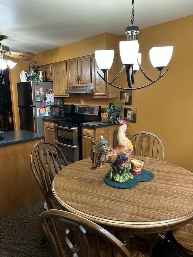 4103 80th St Unit 28A, Kenosha, WI 53142 - dining area with ceiling fan and a chandelier