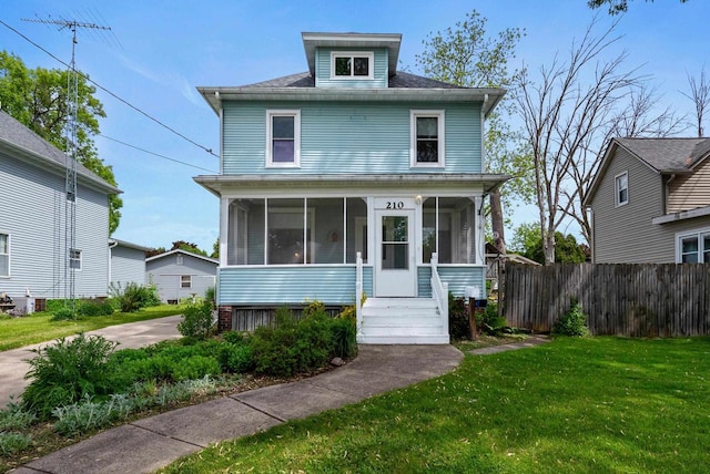210 Gilmore Ave, Beaver Dam, WI 53916 - american foursquare style home featuring a sunroom