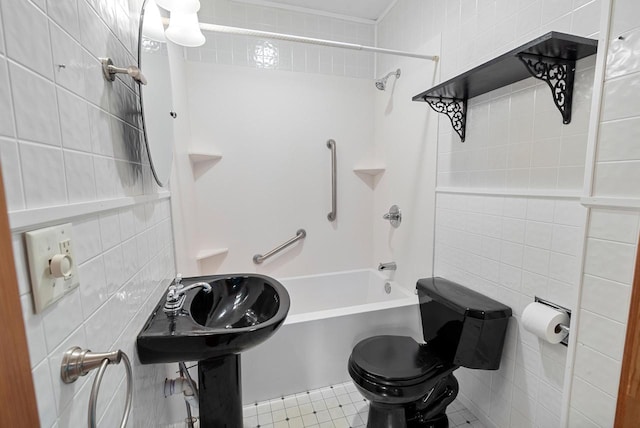 210 Gilmore Ave, Beaver Dam, WI 53916 - full bathroom featuring tile walls,  shower combination, and toilet