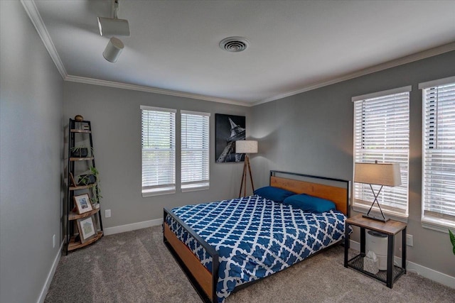 2 Captains Ct Unit 5, Madison, WI 53719 - carpeted bedroom featuring crown molding, multiple windows, and baseboards