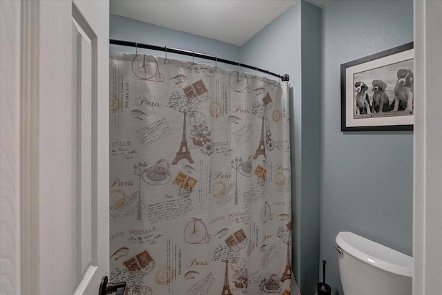 2 Captains Ct Unit 5, Madison, WI 53719 - bathroom featuring toilet and a shower with shower curtain
