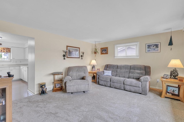 2117 N 27th St, Sheboygan, WI 53081 - living room featuring light carpet and baseboards