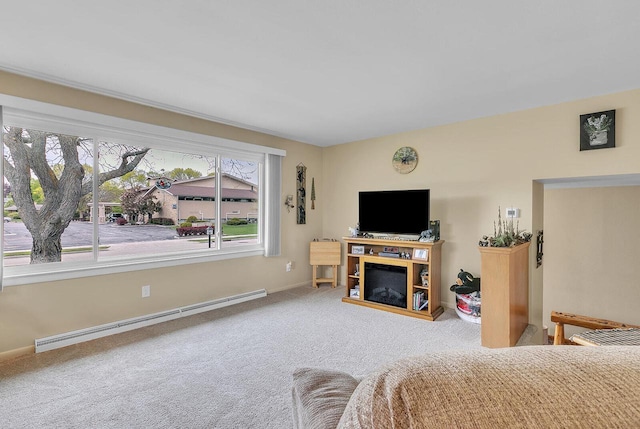 2117 N 27th St, Sheboygan, WI 53081 - bedroom with a baseboard heating unit, carpet flooring, and baseboards