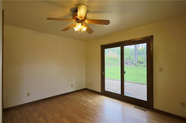 1217 Andover Ave, Eau Claire, WI 54703 - empty room featuring wood finished floors and baseboards