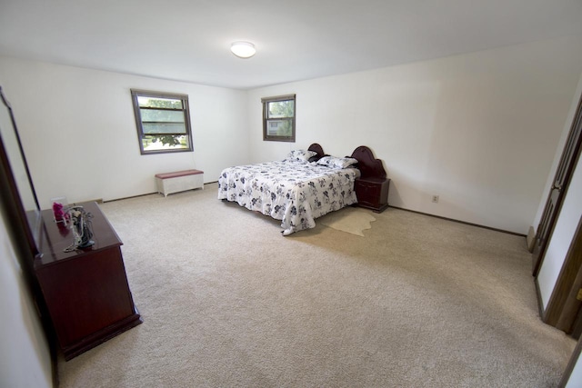 6538 N Bethmaur Ln, Glendale, WI 53209 - carpeted bedroom featuring baseboards