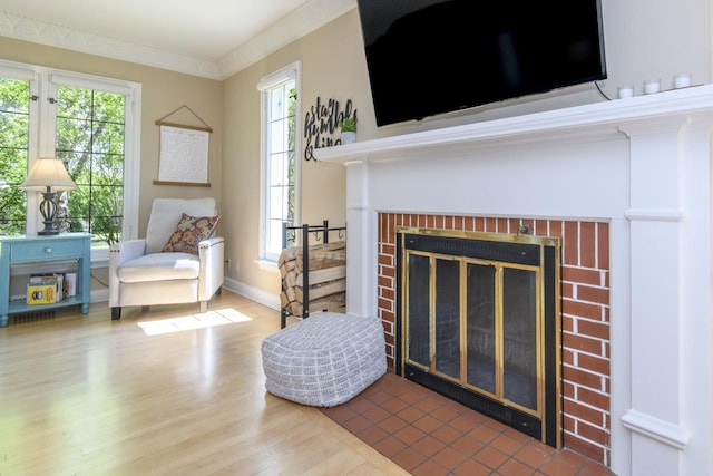 5744 W Rita Dr, West Allis, WI 53219 - living room featuring a fireplace, wood finished floors, and baseboards