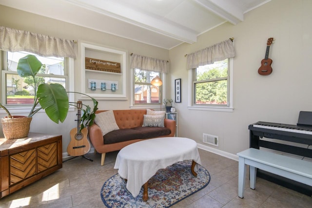 5744 W Rita Dr, West Allis, WI 53219 - living area featuring beamed ceiling, tile patterned flooring, and baseboards