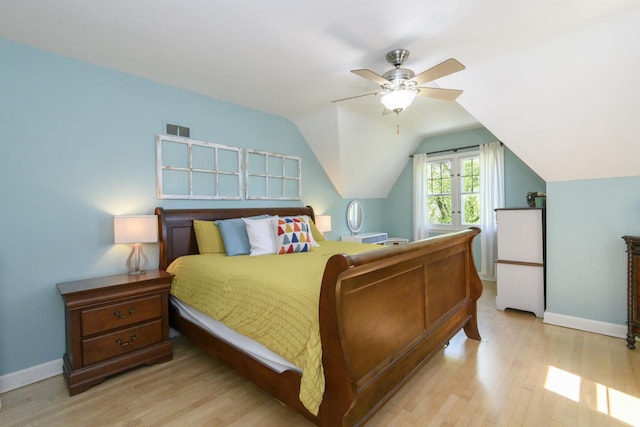 5744 W Rita Dr, West Allis, WI 53219 - bedroom with light wood finished floors, baseboards, ceiling fan, and lofted ceiling