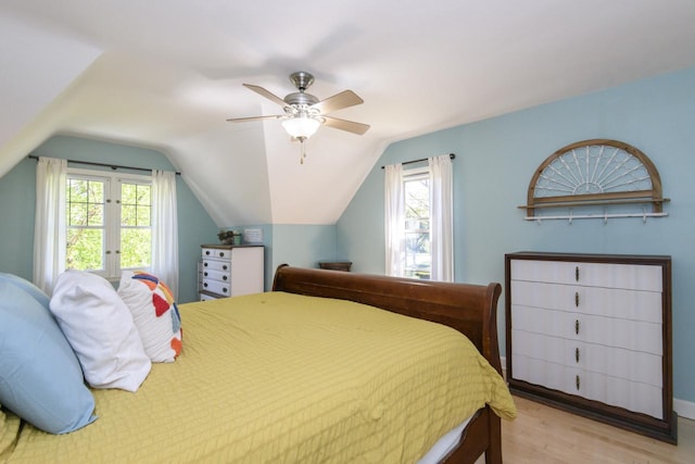 5744 W Rita Dr, West Allis, WI 53219 - bedroom with wood finished floors, multiple windows, lofted ceiling, and ceiling fan