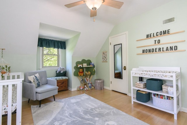 5744 W Rita Dr, West Allis, WI 53219 - bedroom featuring vaulted ceiling, wood finished floors, baseboards, and a ceiling fan