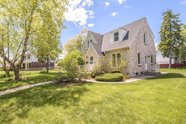 5744 W Rita Dr, West Allis, WI 53219 - view of property exterior with stone siding and a shingled roof