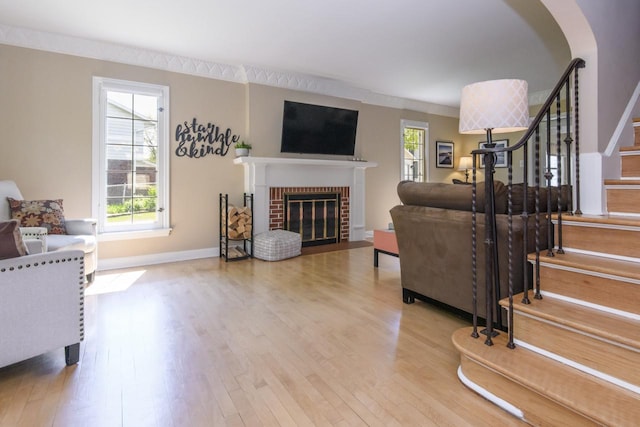 5744 W Rita Dr, West Allis, WI 53219 - living room with stairway, wood finished floors, a fireplace, and baseboards