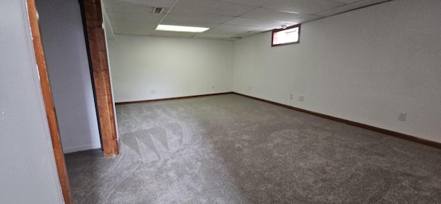 2210 Taylor Ave, Racine, WI 53403 - below grade area featuring carpet floors, a drop ceiling, and baseboards