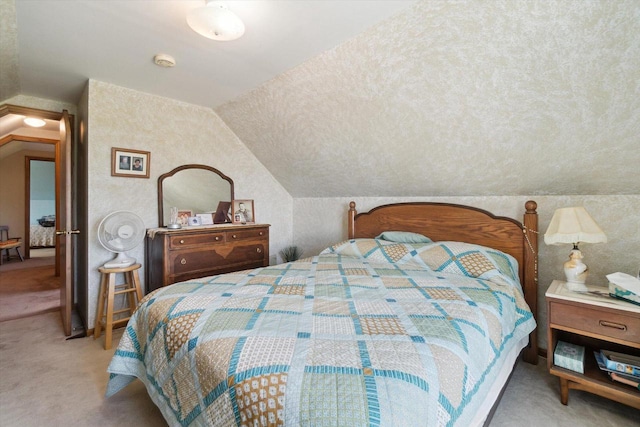 W7211 Pine Rd, Thorp, WI 54771 - bedroom featuring carpet flooring and vaulted ceiling