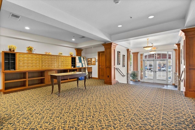 832 N 6th St Unit 118, Sheboygan, WI 53081 - playroom with decorative columns, carpet flooring, recessed lighting, french doors, and baseboards