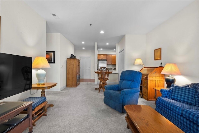 832 N 6th St Unit 118, Sheboygan, WI 53081 - living room featuring light colored carpet, recessed lighting, and baseboards