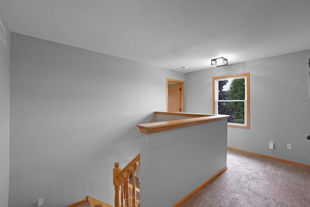 371 Thurow Dr, Oconomowoc, WI 53066 - hall with an upstairs landing, baseboards, and carpet flooring