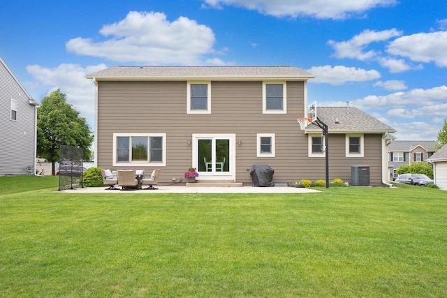 371 Thurow Dr, Oconomowoc, WI 53066 - back of house with a patio area, central AC, and a lawn