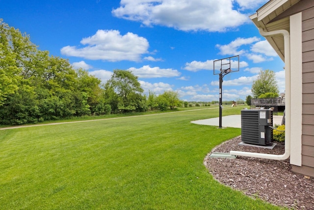 371 Thurow Dr, Oconomowoc, WI 53066 - view of grassy yard featuring central air condition unit